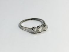 An Edwardian old cut three stone Diamond trilogy ring in 18ct white gold, platinum set. ETCW 0.