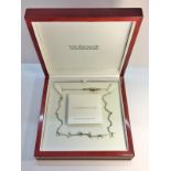 A Hot Diamonds Sterling Silver, diamond and pearl necklace, boxed.