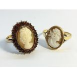 Two carved shell cameo rings.