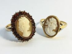 Two carved shell cameo rings.