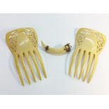 A pair of Art Nouveau hair combs plus a 19th Century wild boar tusk brooch in 9ct rose gold