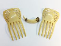 A pair of Art Nouveau hair combs plus a 19th Century wild boar tusk brooch in 9ct rose gold