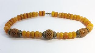 A Tibetan Resin Bead Necklace,