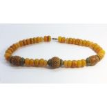 A Tibetan Resin Bead Necklace,