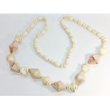 A Rhodochrosite hardstone bead necklace, the large faceted Rhodochrosite beads each measure 4cm,