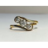 A Victorian 3 Stone Diamond Ring with 18ct Yellow Gold Crossover Shank.
