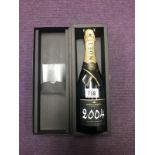 A boxed bottle of 2004 Moet & Chandon champagne.
