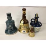 3 wade whisky bells with contents including 20 years old Royal reserve (sealed) and Lamb's Navy rum