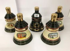 A collection of 5 Christmas wade whisky bells,