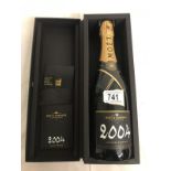 A bottle of 2004 Moet & Chandon Grand vintage.