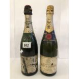 2 bottles - Moet Et Chandon Premiere Cuvee and a bottle of Moet Et Chandon (label warn,