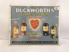 A Duckworth's Essences & Colours Heart brand card advertising sign.