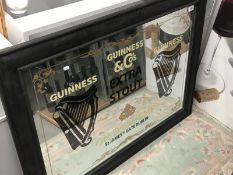 A Guinness advertising mirror.