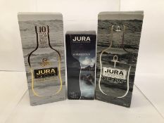 3 bottles - Jura Origin, and two bottles of Superstition (1x 35cl,