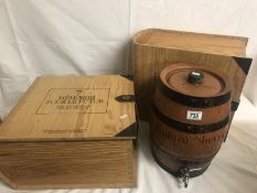 2 wine boxes and a sherry barrel.