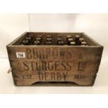 A Burrows & Sturgess LTD Derby beer bottle crate with quantity of beer bottles (some empty,