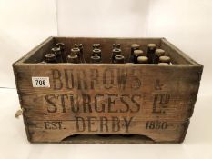 A Burrows & Sturgess LTD Derby beer bottle crate with quantity of beer bottles (some empty,