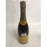 A bottle of Veuve Clicquot dry 1928 champagne.