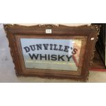 A Dunville's whisky advertising mirror in frame