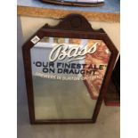 A bass draught ale advertising mirror in frame