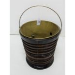 Brass Ice Bucket, in a ribbed mahogany case, carrying handle, 12”h