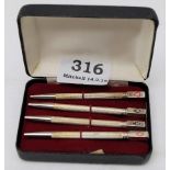 Set of 4 bridge pencils, in silver frames and original case