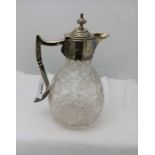 Mid-19thC Rock Crystal Ewer, floral detail on a pear-shaped body, with a silver-plated lid and