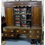 19thC Oak Dresser, an upper gallery with two doors and 2 open shelves, over a base with 5 drawers,