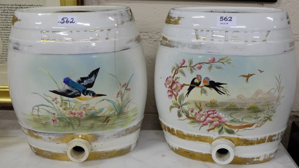 Pair of Porcelain oval-shaped whiskey barrels, painted with wild birds, each 13.5”h