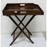 Edwardian Mahogany Butlers Tray on a folding stand with turned legs, 25”w x 32”h