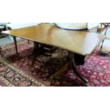 Regency Mahogany Dining Table with removeable centre leaf, on a twin pod base, brass es, casrs, 66”l