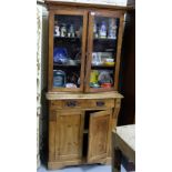 Antique Stripped Pine Bookcase, 2 glass shelves over a two door cabinet, 76”h x 36”w