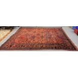 Wool Floor Rug, red ground with navy pattern borders, silken hues, 3.5m x 2.8m