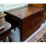 Polished mahogany drop leaf table, on chamfered legs, 39”w, extends 78”