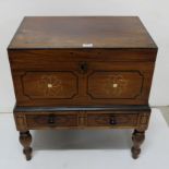Indian Mahogany Cellarette, with a hinged lid, over a base with 2 drawers, on turned feet, floral