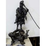 Chinese Carved Root Figure of a man with hand lamp and staff, an original base in the form of a tree