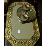 Brass ware items - wall mirror, pair candlicks & pair of circular wall plates (dogs)