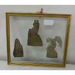 3 x Pilgrim relics, beaten brass, in a glass display frame, 10” x 9”