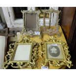 Two pairs of brass Pho Frames, both ornately detailed