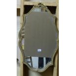 Gilt framed wall mirror, serpentine shaped frame, 32”h