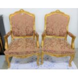 Matching Pair of Carved Gilt Wood Framed Armchairs, with a shaped p over a mauve satin covered