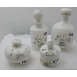 4 opalene glass perfume and powder bottles, hand painted with floral designs