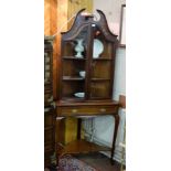 Edw. Inlaid Mahogany Corner Cabinet, with a swan neck p over two glass doors and a drawer and