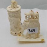 2 carved ivory figures – elephant carriage (4”h) and herd of elephants (5”)