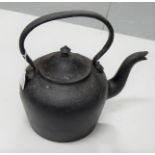 Old cast iron kettle, painted black