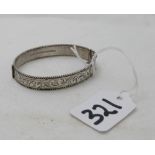 Lady’s silver bangle, hallmarked Birmingham, filigree engraving