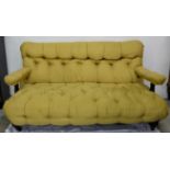 Vicrian Ebonised Mahogany Framed Settee, deep butned with yellow fabric, sprung seat, on turned legs