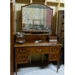 Inlaid Mahogany Dressing Table with a mirror back, gallery drawers, tapered legs, 48”w