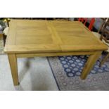 Solid Oak Extending Dining/Kitchen Table, on tapered legs, 55” long (displayed) x 36”w
