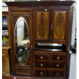 Edwardian Inlaid Mahogany Compactium Wardrobe, an oval mirror inset with a bank of 5 drawers and two